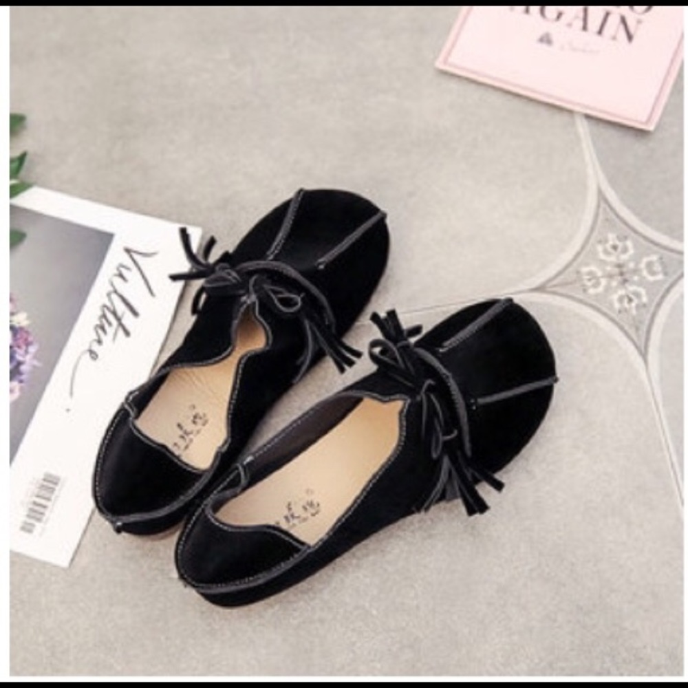 Women’s black suede loafers, size 6.5.